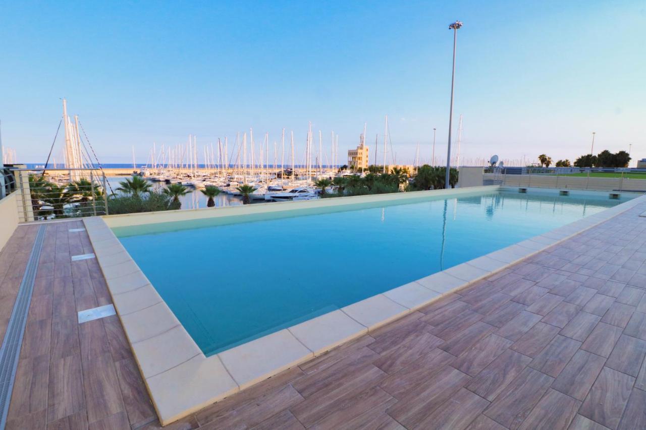 Ferienwohnung H11 Luxury 9A - Porto - Piscina - Jacuzzi Santo Stefano al Mare Exterior foto